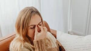 woman suffering from winter allergies