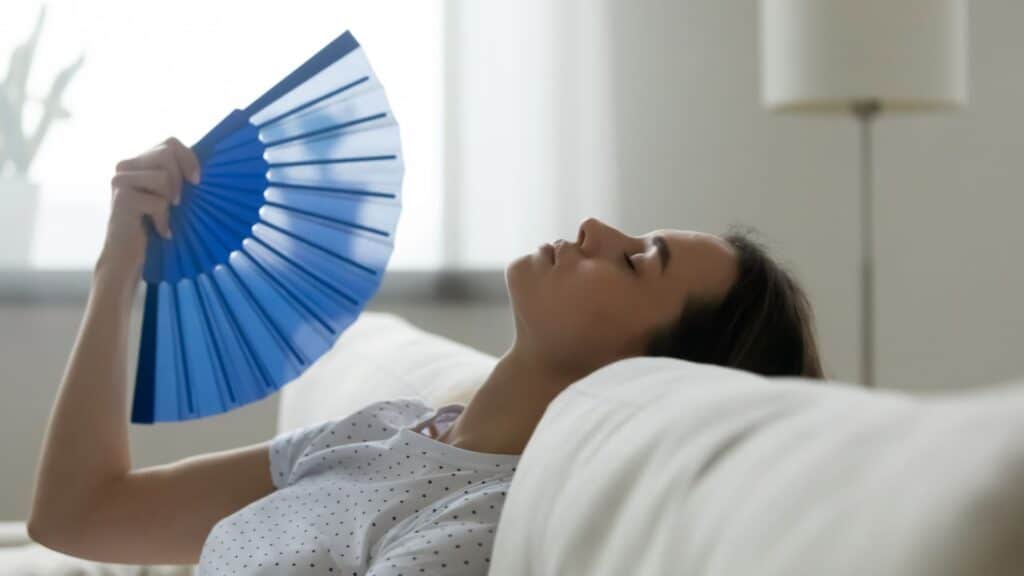 person using a fan