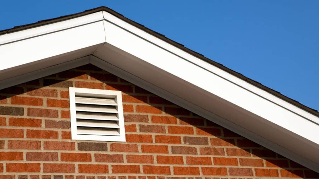 exterior air vent on a brick house